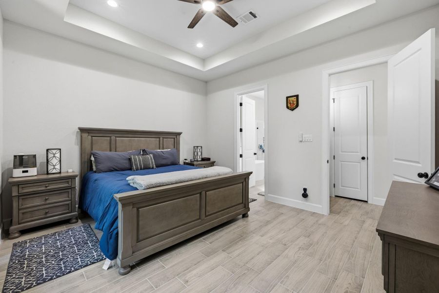 Furnished interior view inside a new home in , Roman Forest (Image 7).