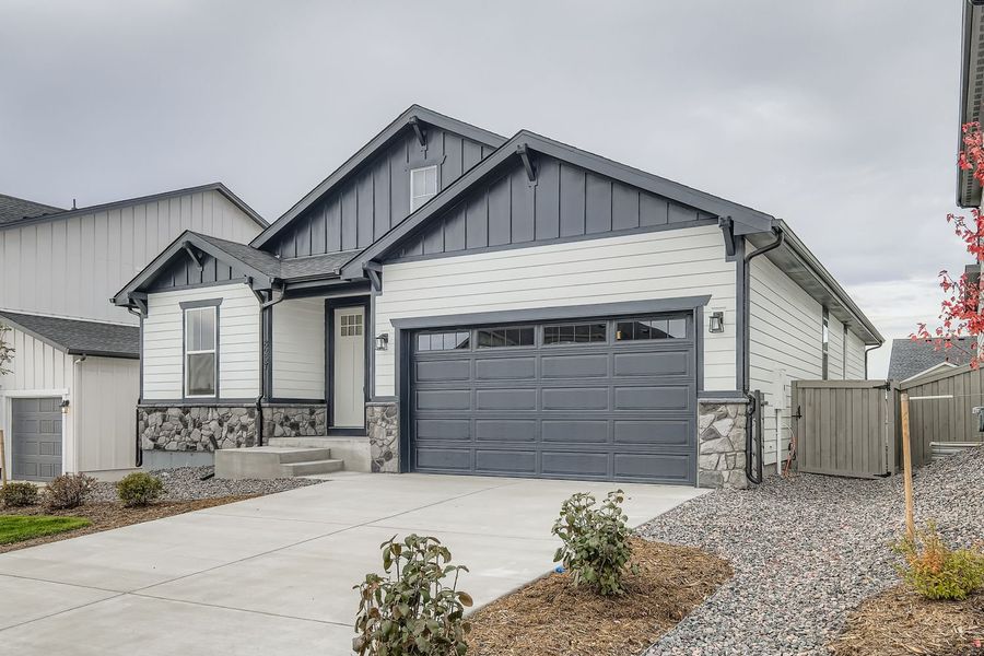 Front exterior of a new home in Sterling Ranch Homestead 50s, Colorado Springs, CO, highlighting curb appeal (Image 2).