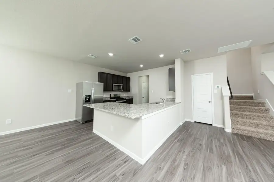 Furnished interior view inside a new home in Mackenzie Creek, Conroe (Image 6). Furnished interior view inside a new home in Mackenzie Creek, Conroe (Image 6).
