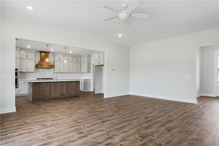 An open-concept design connects a contemporary kit