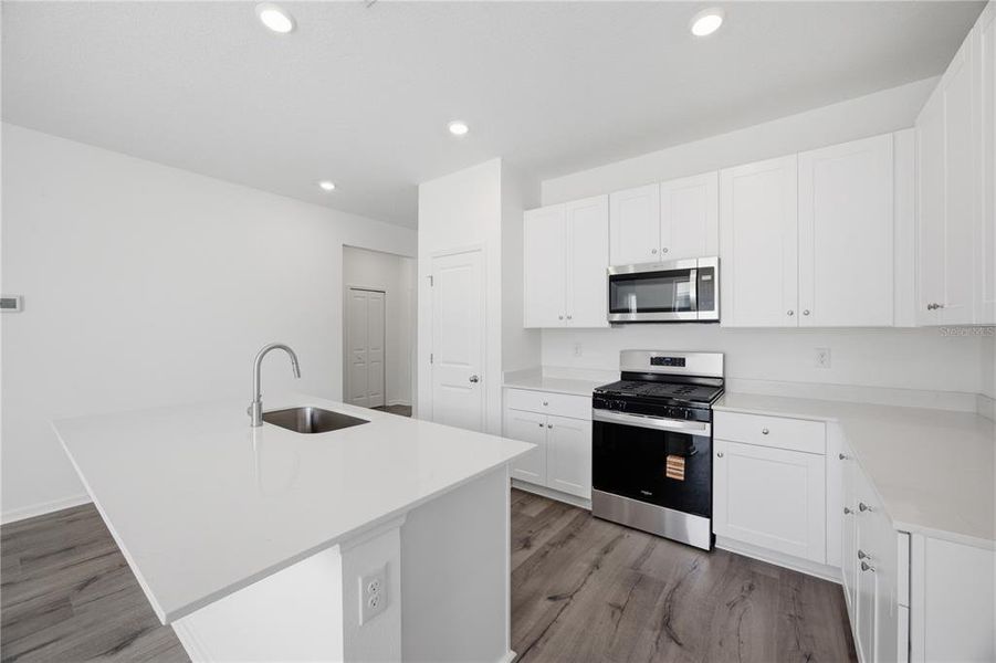 Furnished interior view inside a new home in , Okahumpka (Image 6).