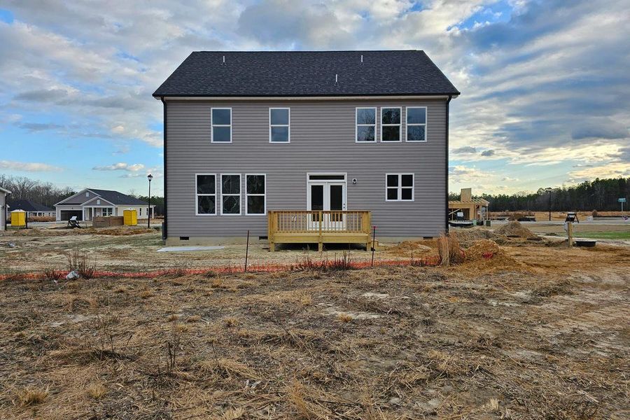 Front exterior of a new home in Wellers Knoll, Lillington, NC, highlighting curb appeal (Image 55). Front exterior of a new home in Wellers Knoll, Lillington, NC, highlighting curb appeal (Image 55).
