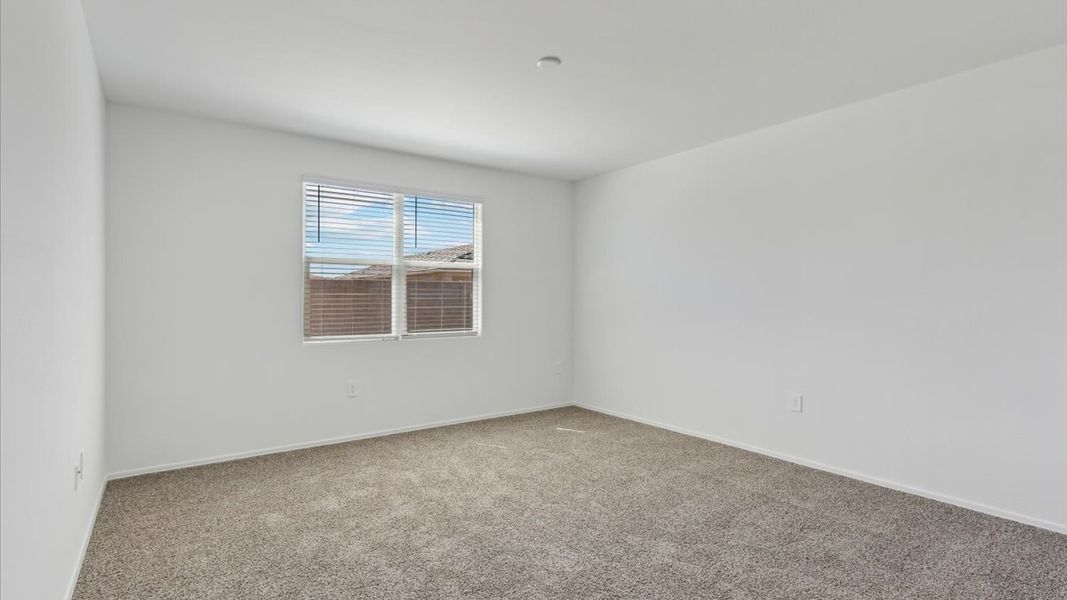 Spacious, unfurnished interior of a new home in Radiance at Superstition Vistas, Apache Junction (Image 15).