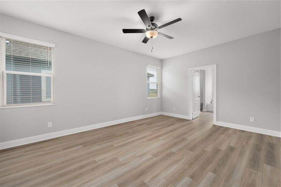 Spacious, unfurnished interior of a new home in Gum Lake Preserve, Lake Alfred (Image 21).