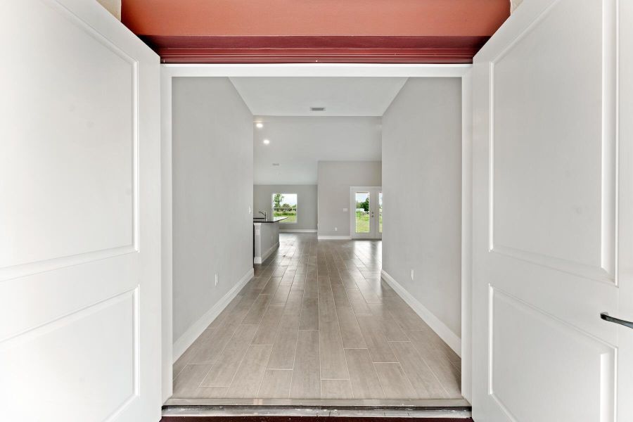 Front exterior of a new home in , Loxahatchee, FL, highlighting curb appeal (Image 15).