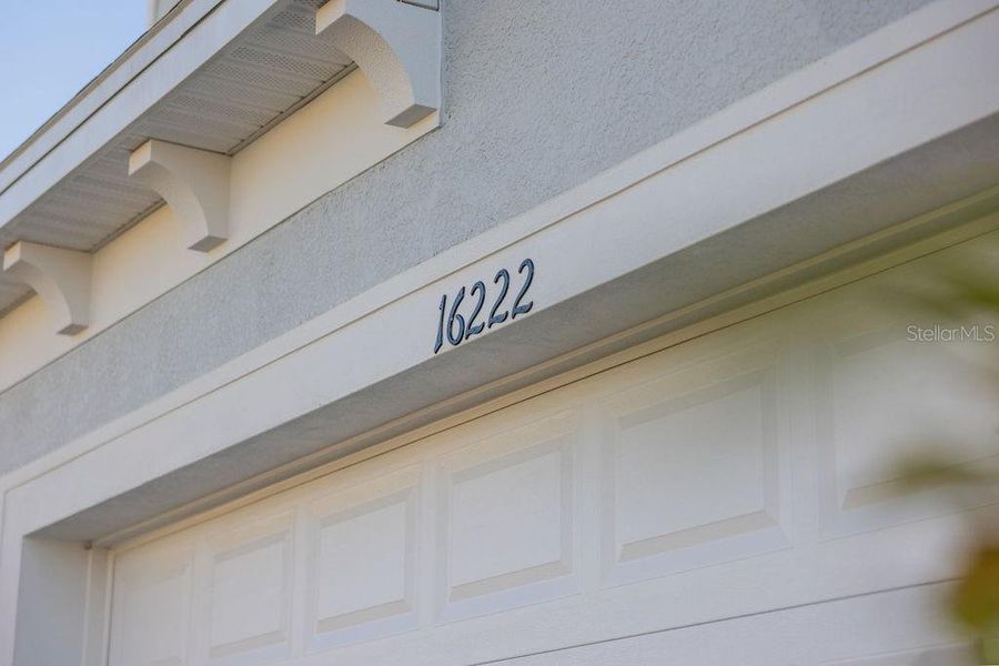 Front exterior of a new home in , Clermont, FL, highlighting curb appeal (Image 2).