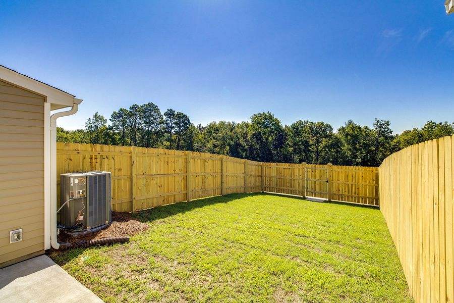 Front exterior of a new home in Astoria, Columbia, SC, highlighting curb appeal (Image 18).