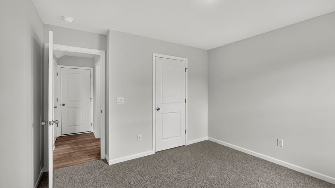 Spacious, unfurnished interior of a new home in Bentley Park, Greenwood (Image 23). Spacious, unfurnished interior of a new home in Bentley Park, Greenwood (Image 23).