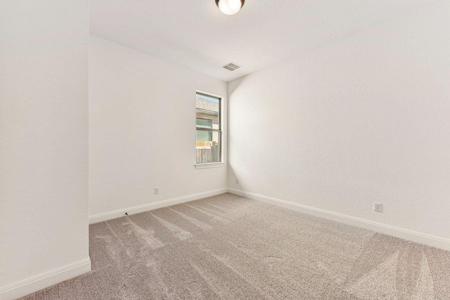 Spacious, unfurnished interior of a new home in 6 Creeks, Kyle (Image 15).