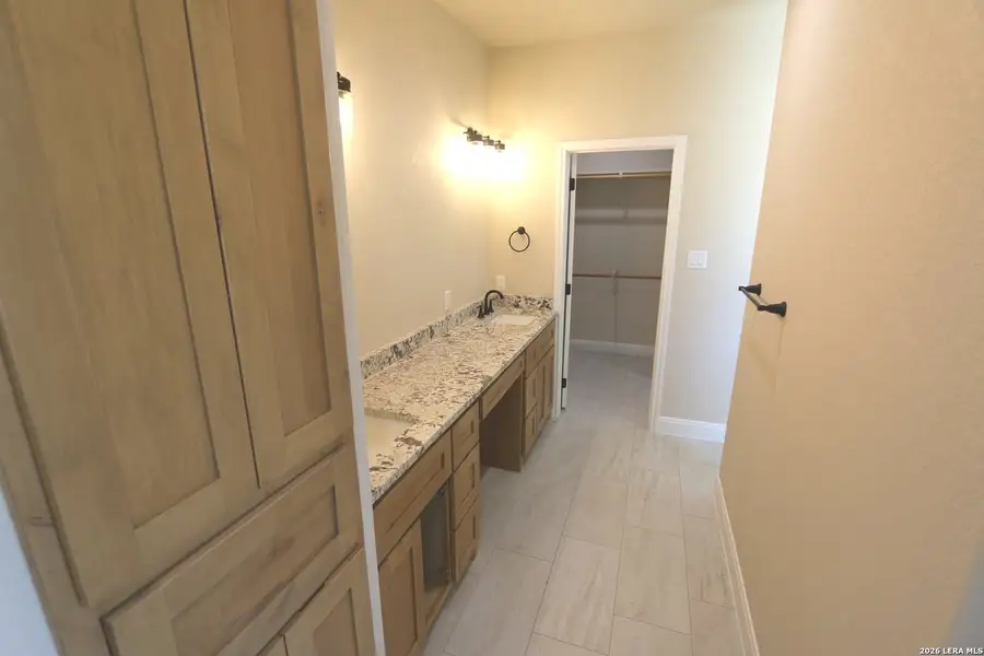 Furnished interior view inside a new home in , Floresville (Image 8).