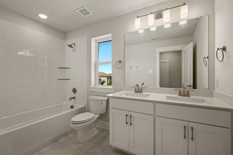 Guests will enjoy their own space in this lovely guest bath!
