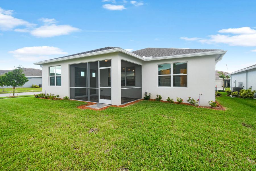 Exterior details and patio area of a home in Del Webb Tradition, Port St. Lucie (Image 23).
