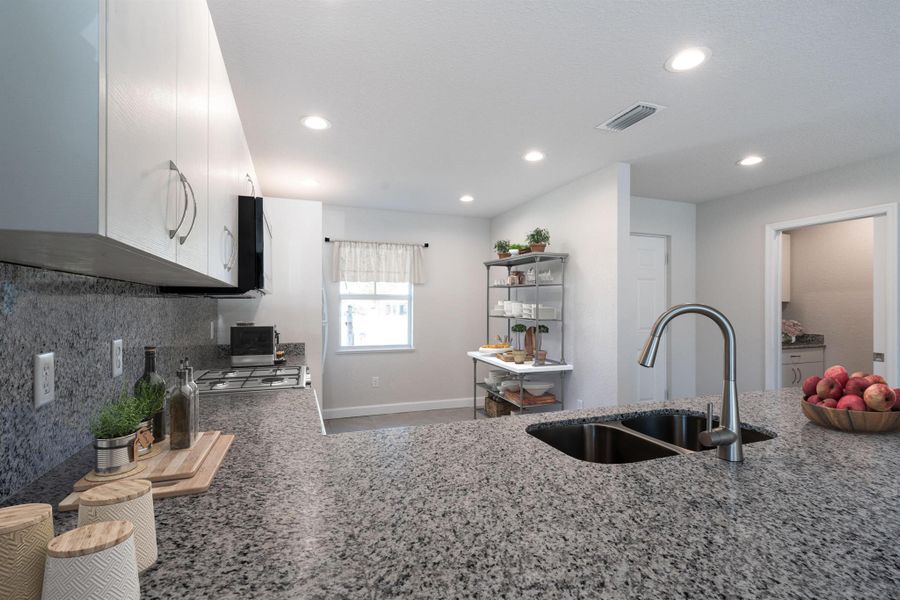 Furnished interior view inside a new home in , Port St. Lucie (Image 8).