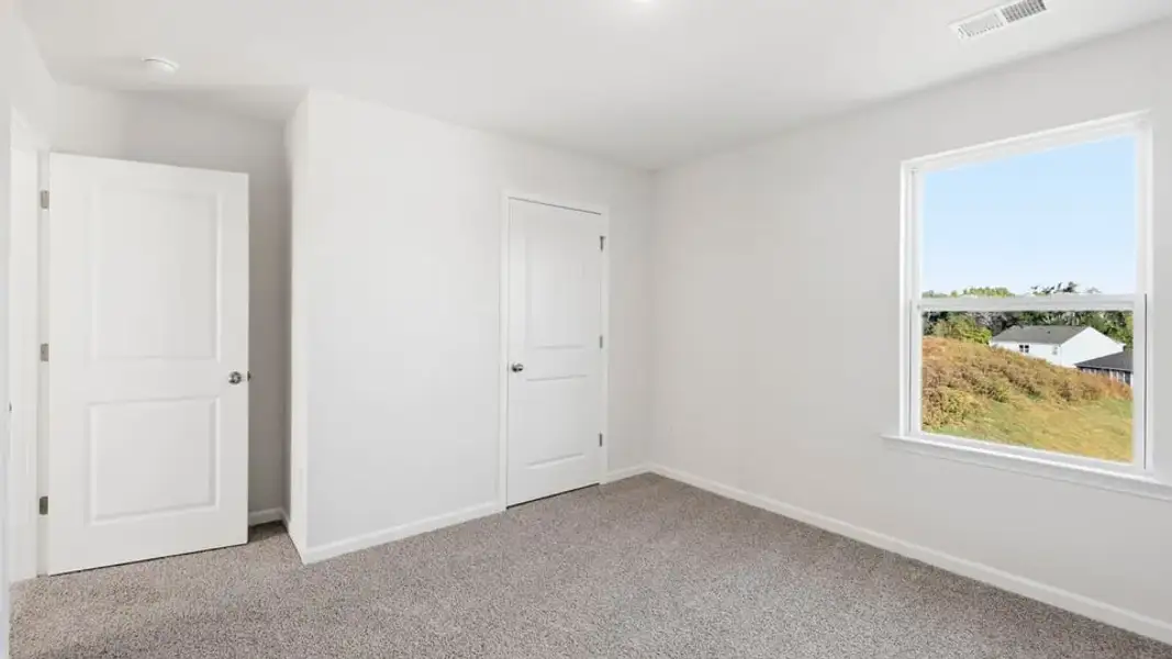 Spacious, unfurnished interior of a new home in Woodglen, Piedmont (Image 30).