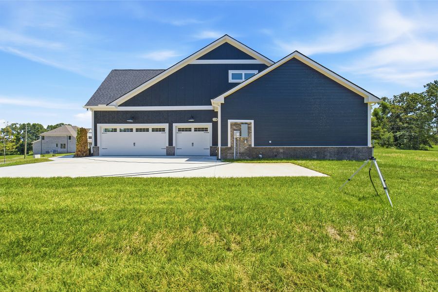 Front exterior of a new home in Belvoir, Fairview, TN, highlighting curb appeal (Image 30). Front exterior of a new home in Belvoir, Fairview, TN, highlighting curb appeal (Image 30).