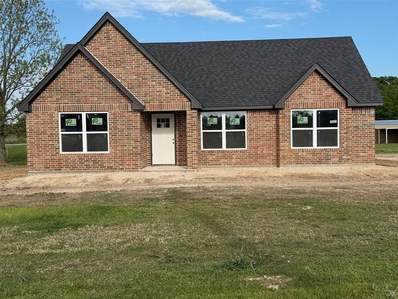 Exterior details and patio area of a home in , Powderly (Image 5).