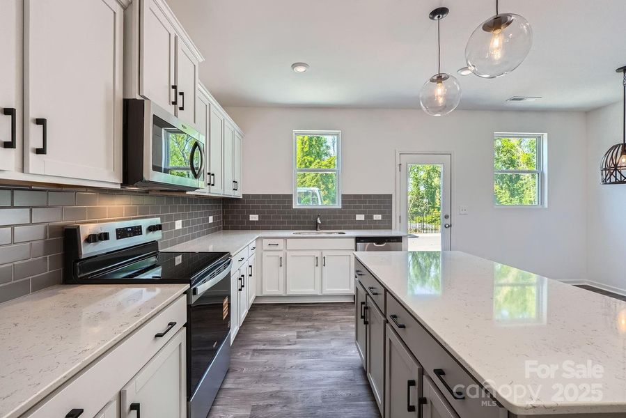 Furnished interior view inside a new home in Dukes Ridge, Charlotte (Image 6).