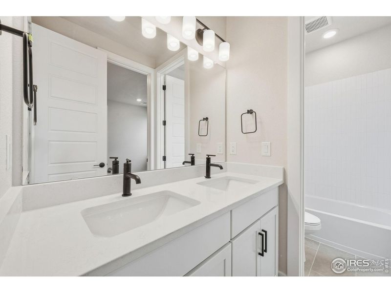 Furnished interior view inside a new home in Festival at RainDance, Windsor (Image 5).