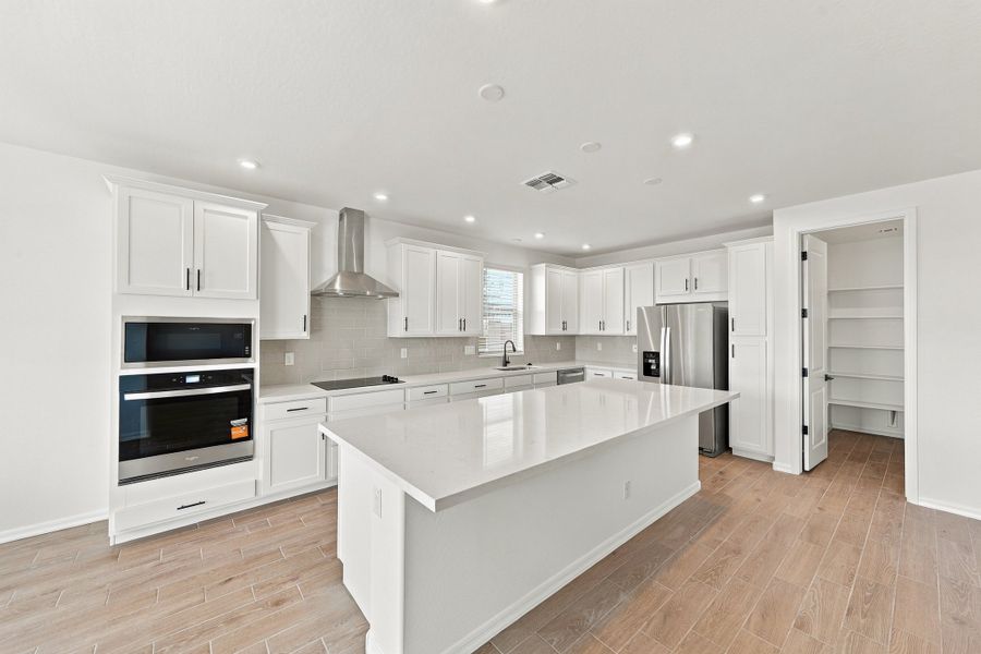 Furnished interior view inside a new home in Tirreno at IronWing, Litchfield Park (Image 6).