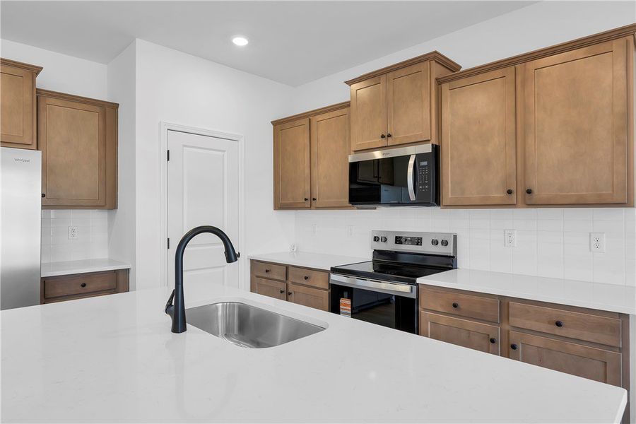This bright kitchen features ample counter space,