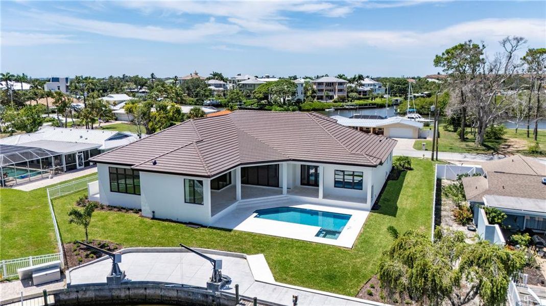 Front exterior of a new home in , Sarasota, FL, highlighting curb appeal (Image 19).