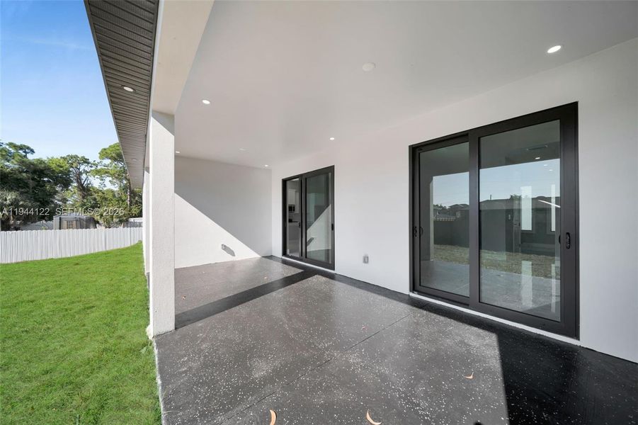 Exterior details and patio area of a home in , Lehigh Acres (Image 3).