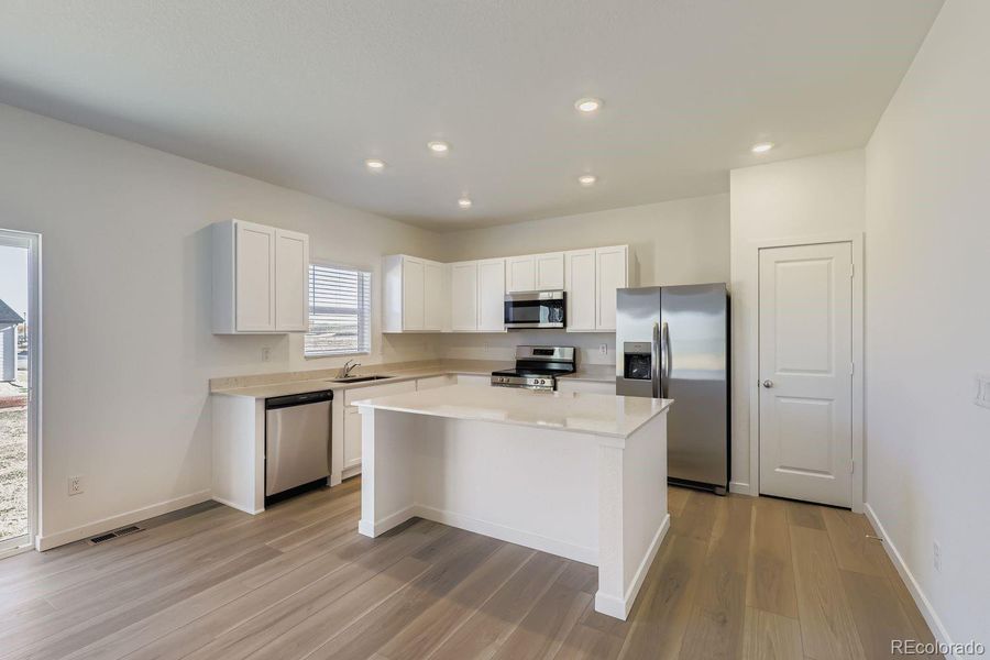 Furnished interior view inside a new home in Eastcreek Farm: The Camden Collection, Thornton (Image 3).