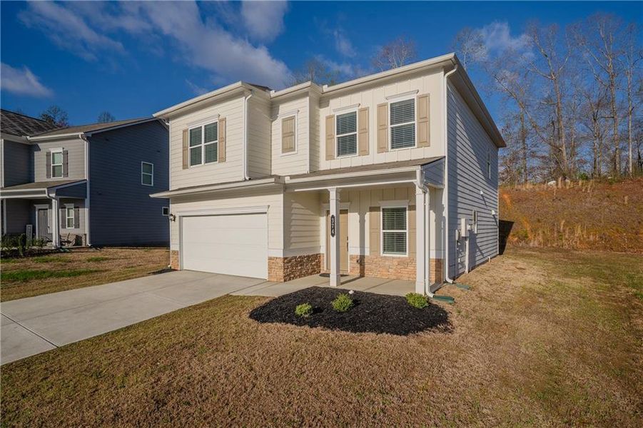 Front exterior of a new home in , Dalton, GA, highlighting curb appeal (Image 24).
