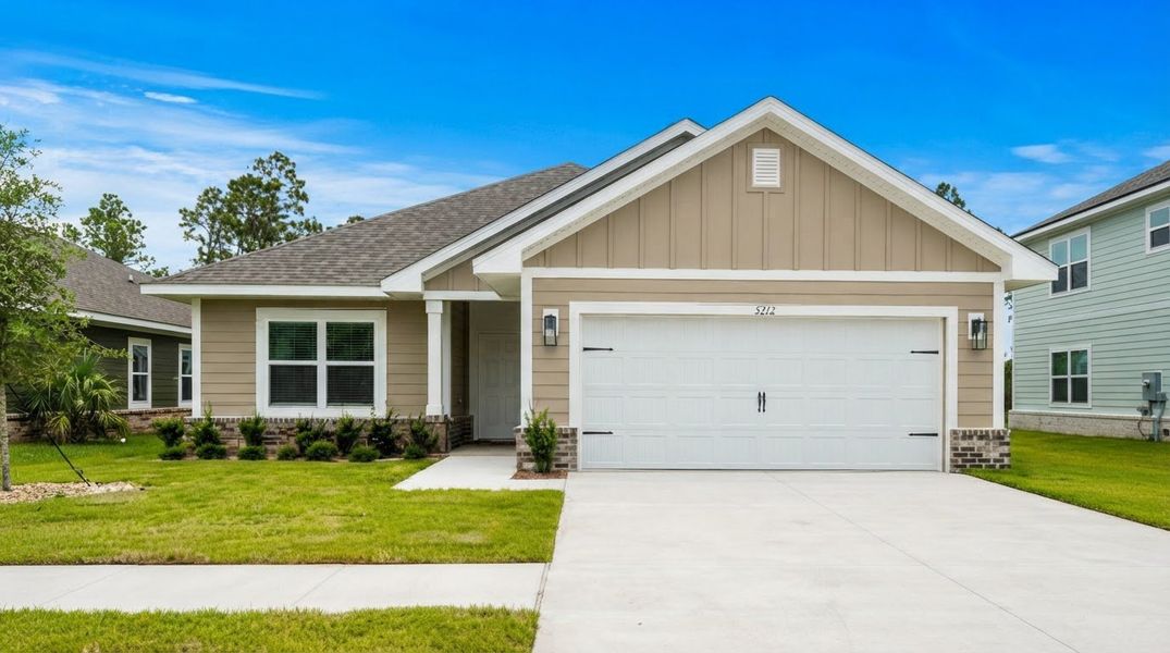 Front exterior of a new home in Parkbrook, Panama City, FL, highlighting curb appeal (Image 1). Front exterior of a new home in Parkbrook, Panama City, FL, highlighting curb appeal (Image 1).