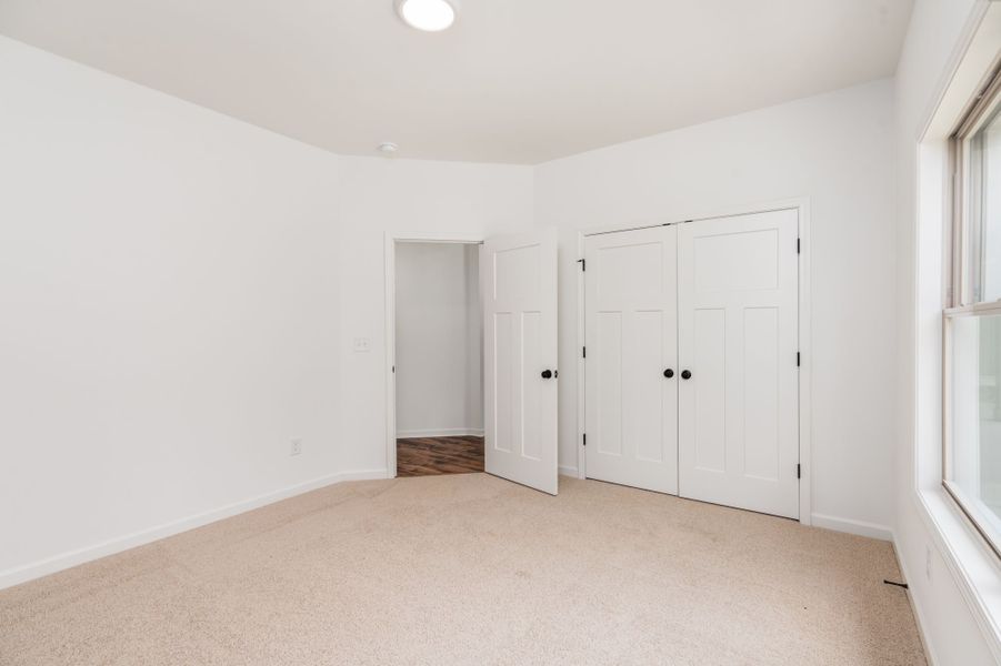 Spacious, unfurnished interior of a new home in Stewart Estates, Meansville (Image 40).