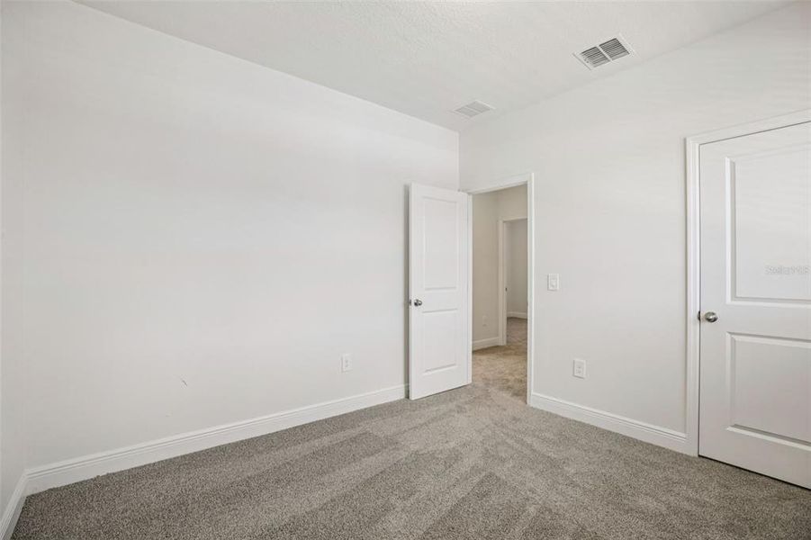 Spacious, unfurnished interior of a new home in Cyrene at Minneola - Villas, Minneola (Image 33).