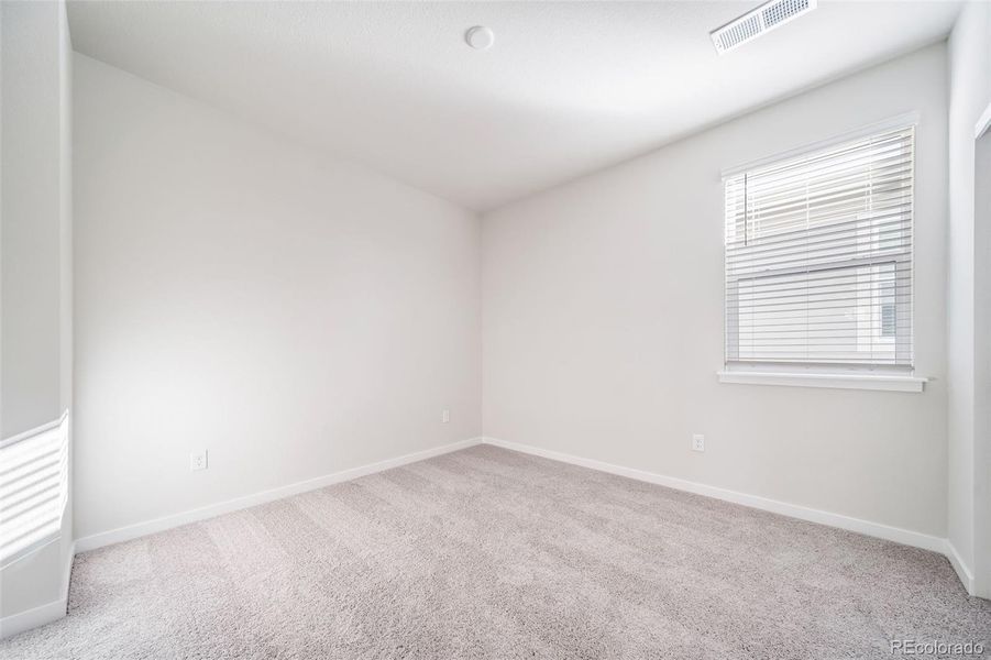 Spacious, unfurnished interior of a new home in Floret Collection at Alder Creek, Parker (Image 34).