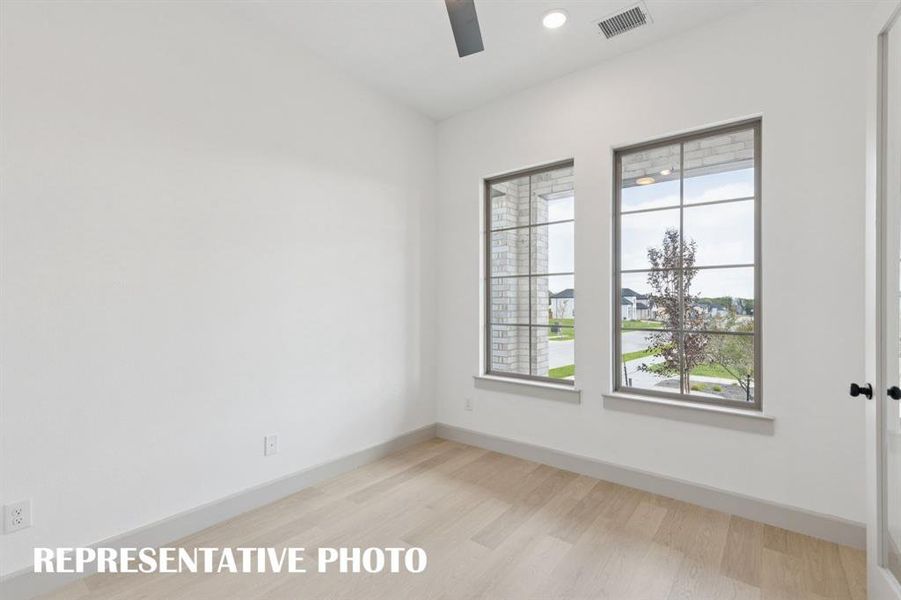This light filled home office is the perfect place for the professional to work from home.  REPRESENTATIVE PHOTO