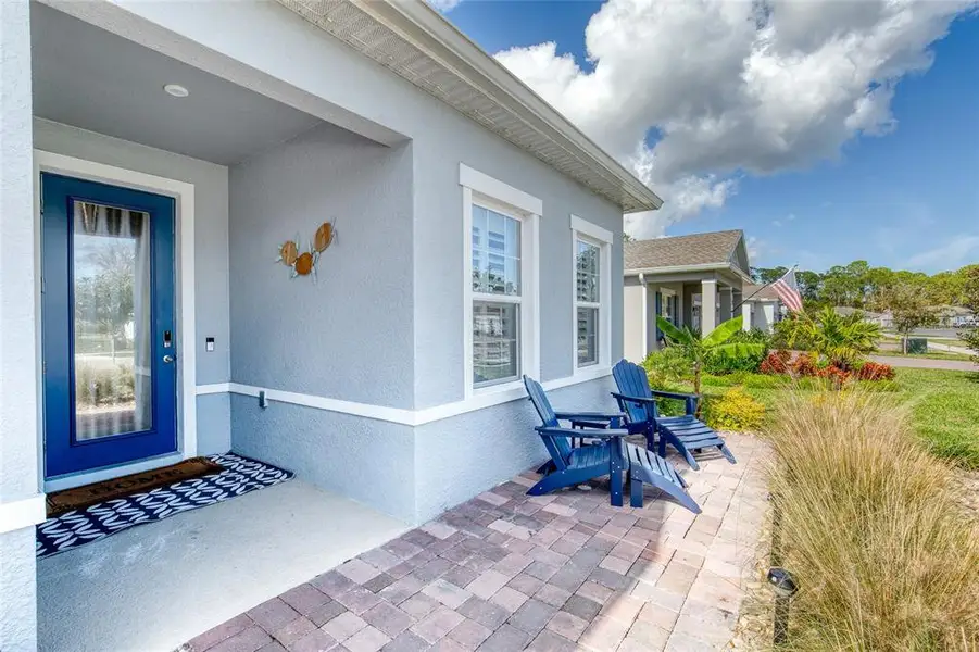 Exterior details and patio area of a home in , New Smyrna Beach (Image 25).