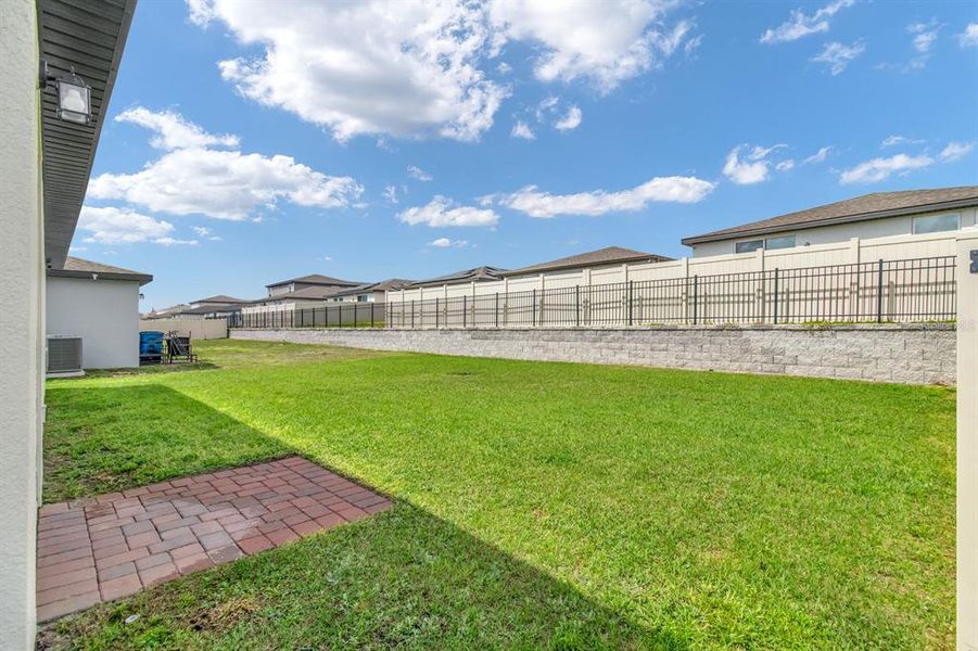 Exterior details and patio area of a home in Lawson Dunes - Signature Series, Haines City (Image 21).