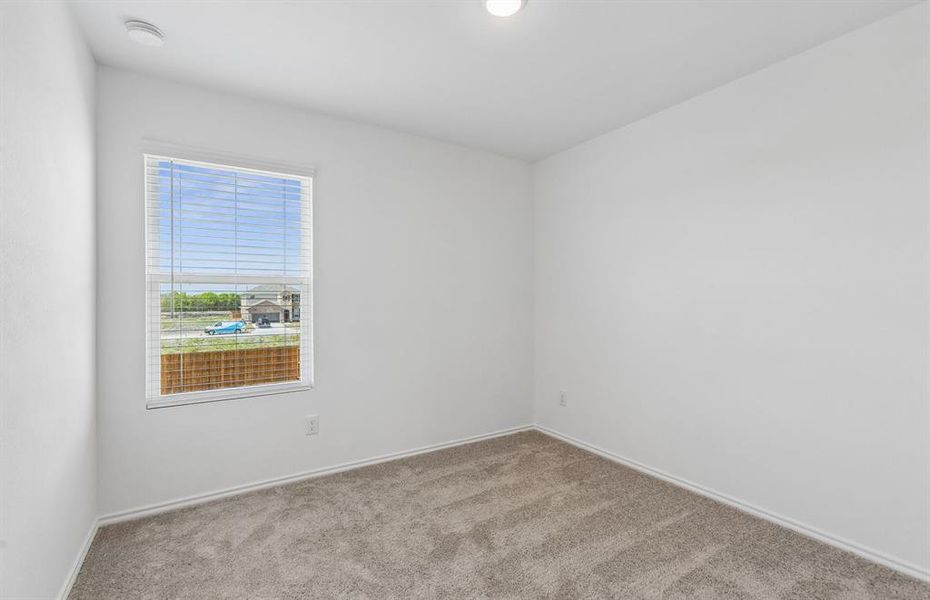 Secondary bedroom with large window