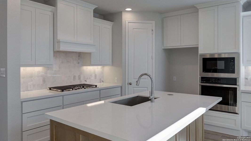 Furnished interior view inside a new home in Ladera 50', San Antonio (Image 13).