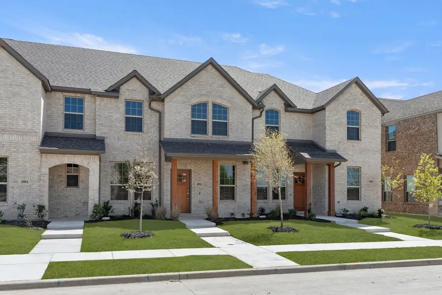 Representative exterior photo of a completed home built from the Arrowhead by Impression Homes in Sanger Circle – Townhomes, Sanger, TX (Image 1). Representative exterior photo of a completed home built from the Arrowhead by Impression Homes in Sanger Circle – Townhomes, Sanger, TX (Image 1).