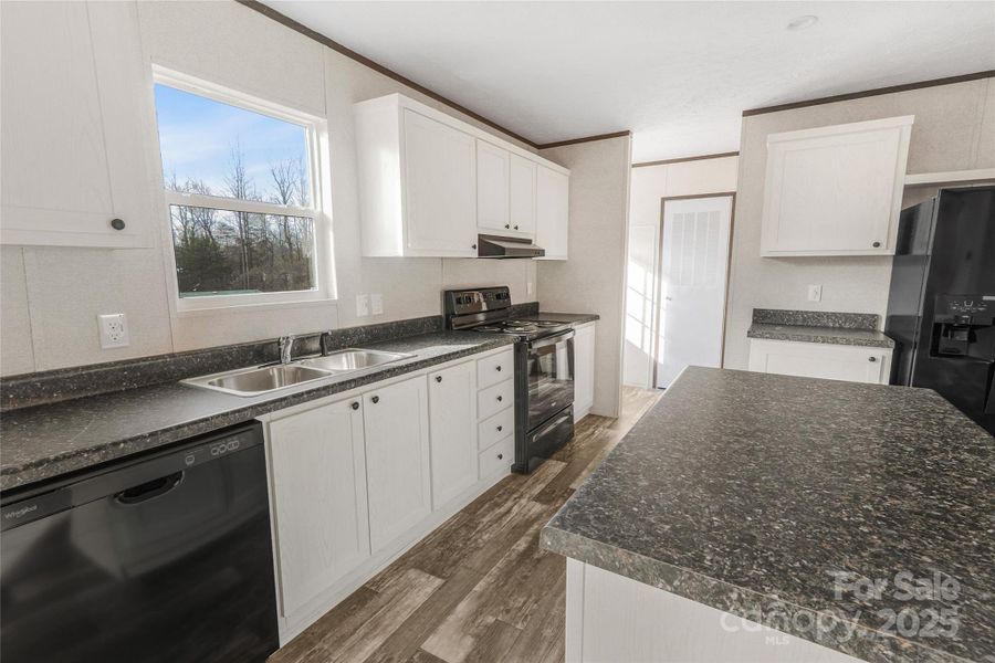 Furnished interior view inside a new home in , Ellenboro (Image 4).
