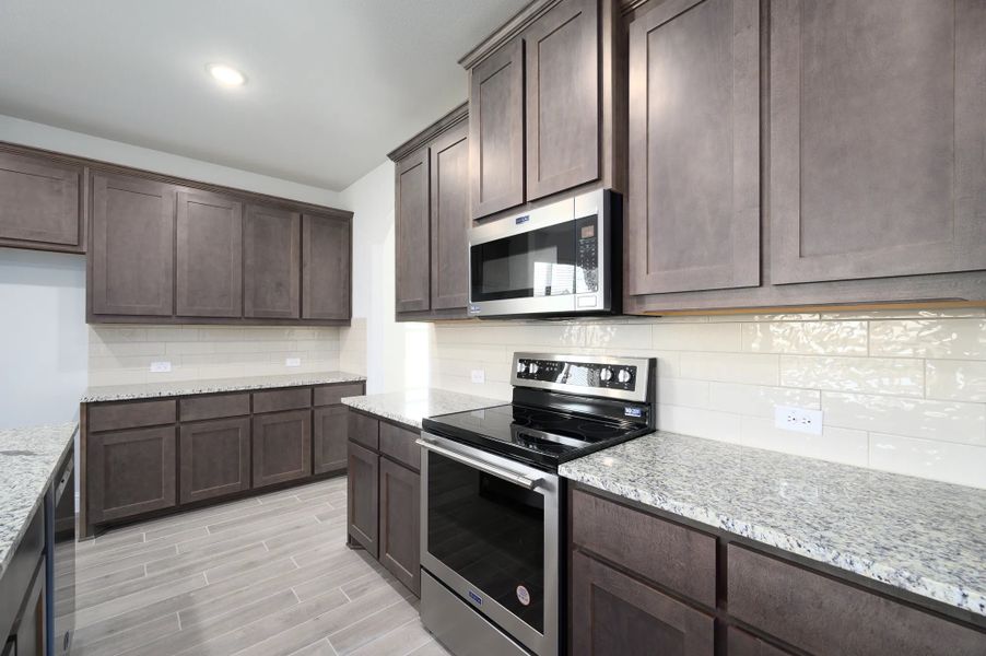 Furnished interior in a model home at Meadow Vista in Anna (Image 18).