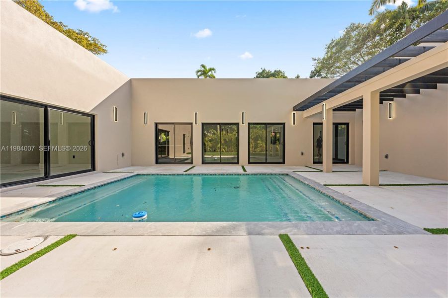 Exterior details and patio area of a home in , North Miami (Image 41).