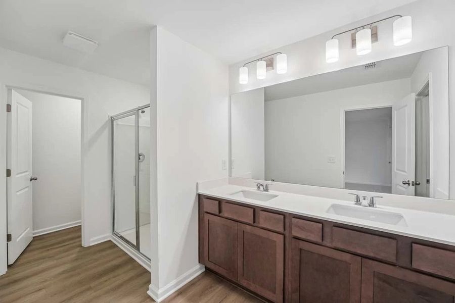 Primary Bathroom Featuring Roosevelt Collection Finishes