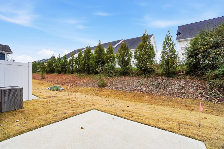 Exterior details and patio area of a home in Harrisburg Village Townhomes, Harrisburg (Image 29).