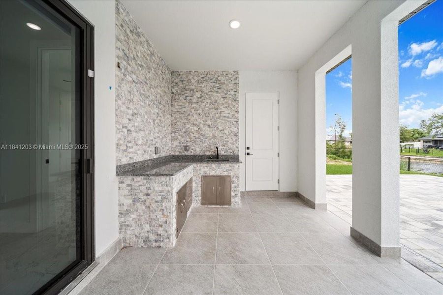 Exterior details and patio area of a home in , Cape Coral (Image 36). Exterior details and patio area of a home in , Cape Coral (Image 36).