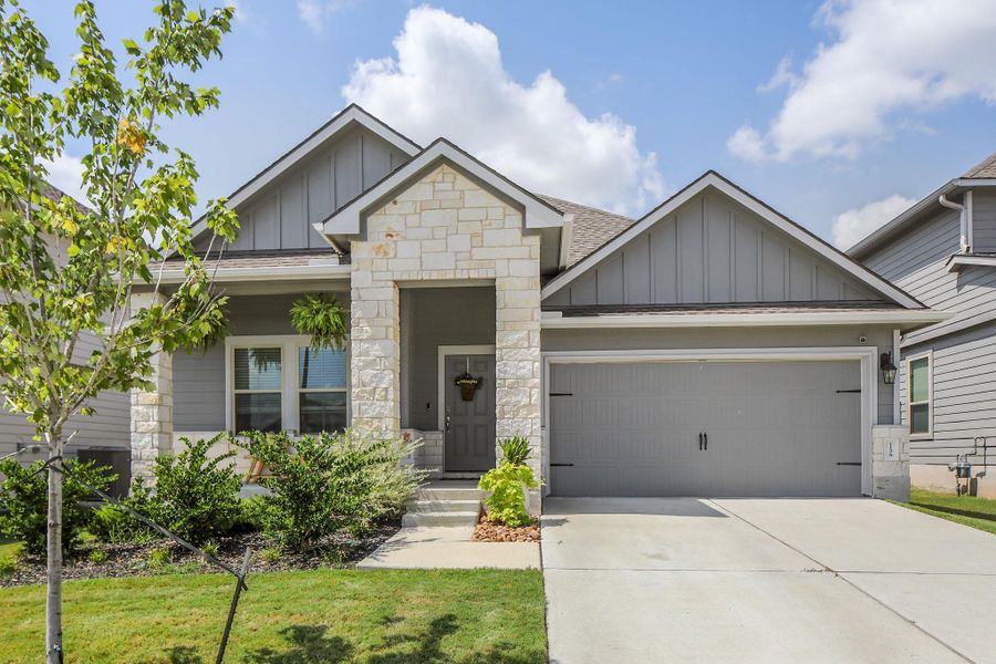 Front exterior of a new home in , College Station, TX, highlighting curb appeal (Image 1).