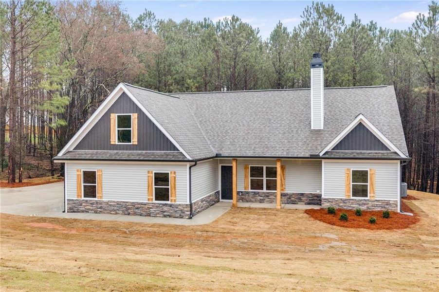 Front exterior of a new home in , Buchanan, GA, highlighting curb appeal (Image 33).