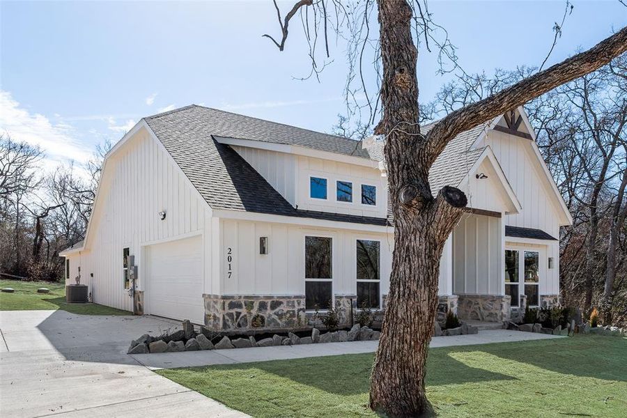 Front exterior of a new home in , Azle, TX, highlighting curb appeal (Image 22). Front exterior of a new home in , Azle, TX, highlighting curb appeal (Image 22).