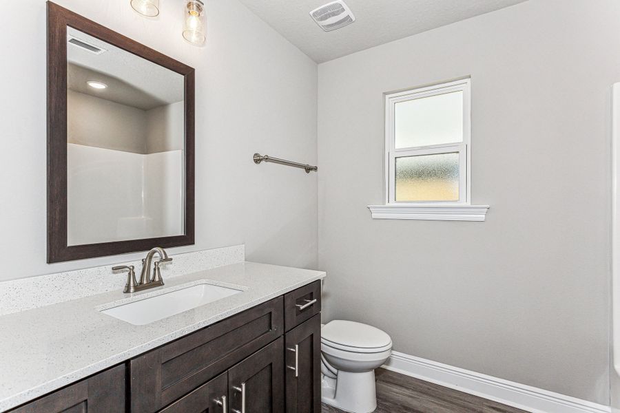 Representative furnished interior of a home built from the The Liberty by Herbst Homes in Prosperity Point, Milton (Image 19).