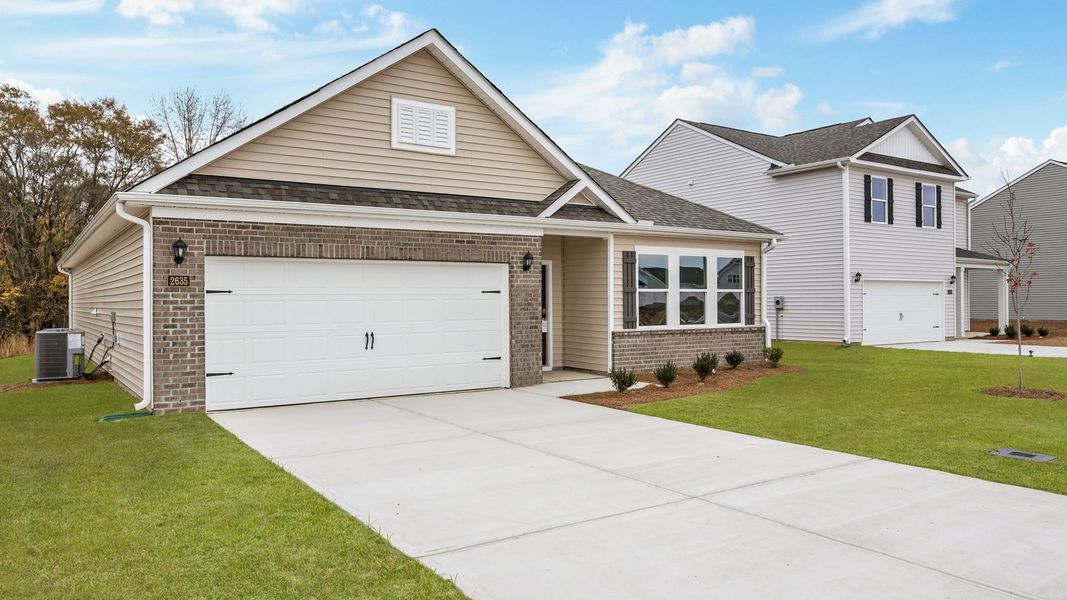 Front exterior of a new home in Villa Grande, Winterville, NC, highlighting curb appeal (Image 2).