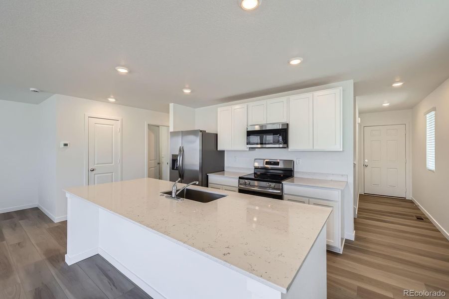 Furnished interior view inside a new home in Copper Chase: The Celestial Collection, Colorado Springs (Image 9).